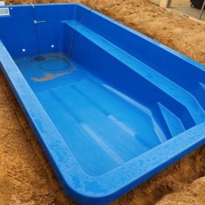 fiberglass_pool_shell_under_construction